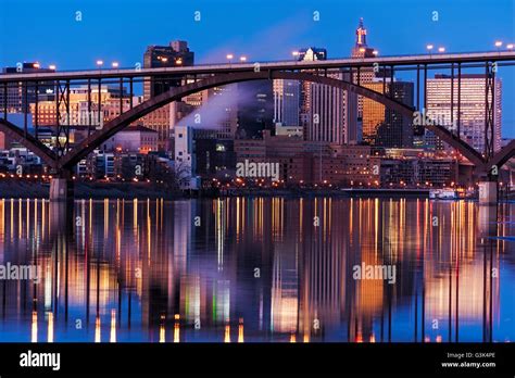 Saint Paul, Minnesota skyline and reflection at dusk with the Smith Ave ...