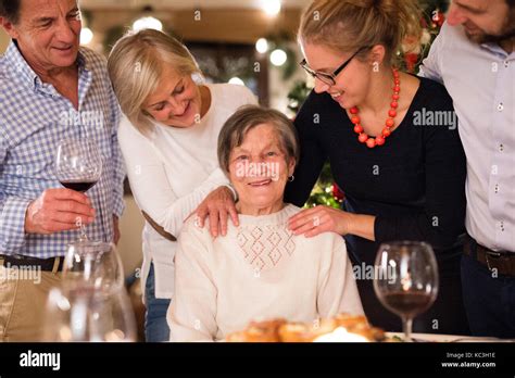 Beautiful big family celebrating Christmas together Stock Photo - Alamy