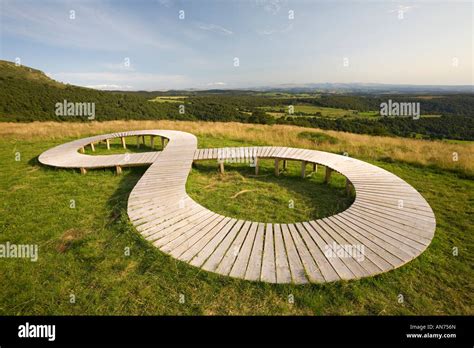 Land Art in a meadow (Puy de Dôme - France). Lemniscate sculpture ...