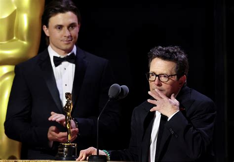 Actor Michael J. Fox accepts honorary Oscar for Parkinson's advocacy ...