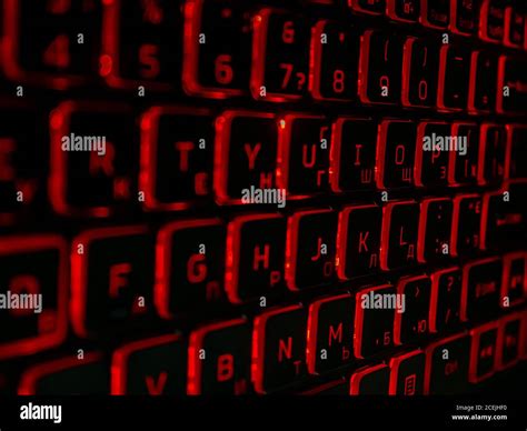 Black computer keyboard with red backlight in the dark Stock Photo - Alamy