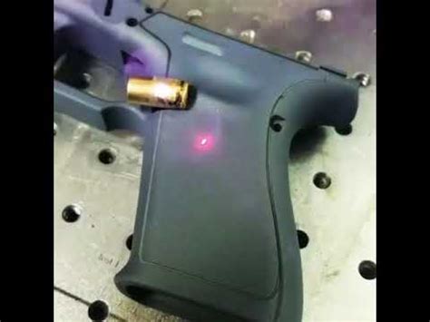 Handgun grip laser engraved - YouTube