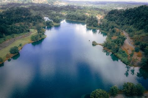 Aerial View Photography of Lake Near Trees · Free Stock Photo