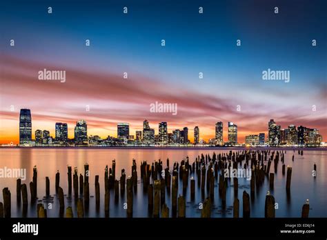 Jersey City skyline at sunset as viewed from Tribeca, New York across ...