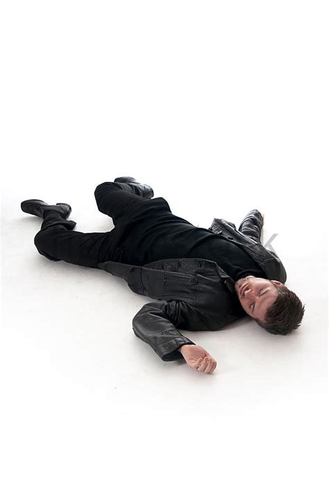 Figurestock | A Figurestock image of a man, laying dead on the floor ...