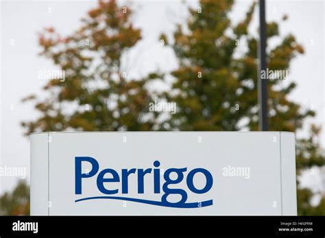 A logo sign outside of the headquarters of the Perrigo Company in ...