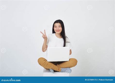 Woman Sitting Using Laptop Sitting on Gray Background Stock Photo ...