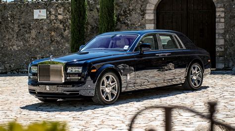 Black Rolls Royce Phantom parked on concrete pavement during daytime HD ...