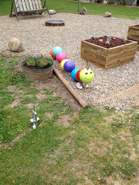 Caterpillar I made from bowling balls | Bowling ball yard art ...