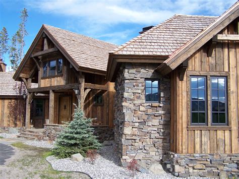 Like the vertical siding & rustic feel. Bavarian stone Cabin | Timber ...