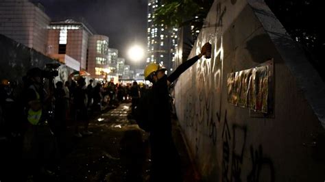 Hong Kong protesters throw Chinese flag into harbour | World News | Sky ...