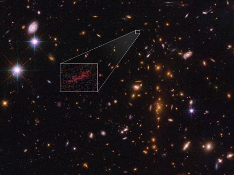 NASA zooms in on one of the oldest galaxies with the help of a cosmic ...