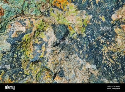 Natural Surface texture of serpentinite. Background with green mineral ...