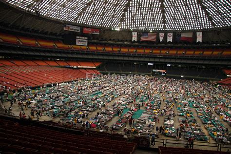 Eon Images | Hurricane Katrina evacuees inside Houston Astrodome