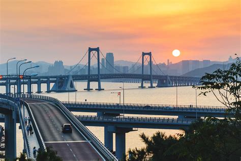 Sunset over the Xinghai bay bridge exp – Song Bai