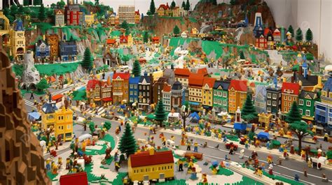 The Lego City Background, A Very Large City Filled With People And ...