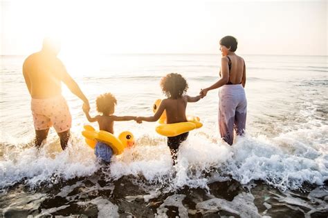 Free Photo | Black family having fun on the beach