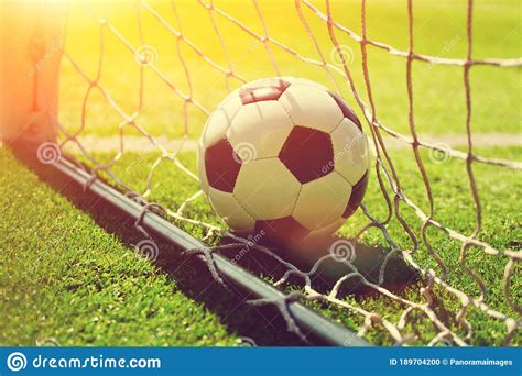 Soccer Ball in the Net of a Goal. Soccer Concept Stock Photo - Image of ...