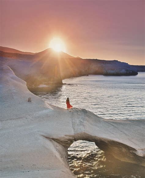 Liz Sarakiniko beach at sunset, on the island of Milos, Greece. Tap on ...