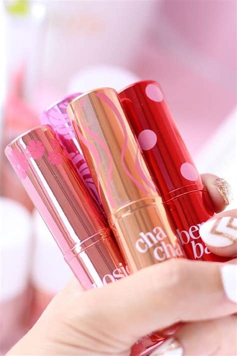 This Benefit Cosmetics Hydrating Tinted Lip Balm sweeps on juicy flavor ...