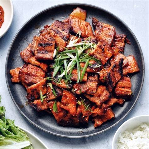 Crispy, fatty pieces of pork belly. Gochujang-based marinade. This is ...