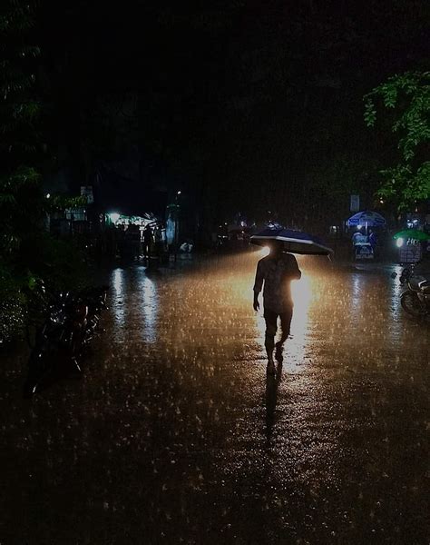 Lonely Boy In Rain Wallpaper