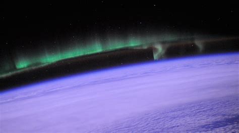 an image of the aurora over earth taken from space