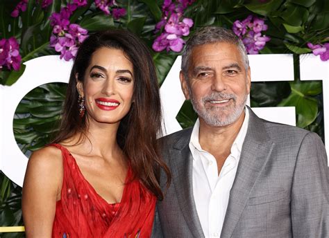 George Clooney Helped Amal Clooney With Her Dress on the Red Carpet ...