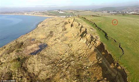 Landslide opens a 900ft crack at Bowleaze Cove near Weymouth, Dorset ...