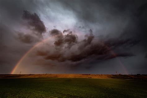 Rainbow With Storm Clouds. Stormy Mood On A Field In The West Of Munich ...