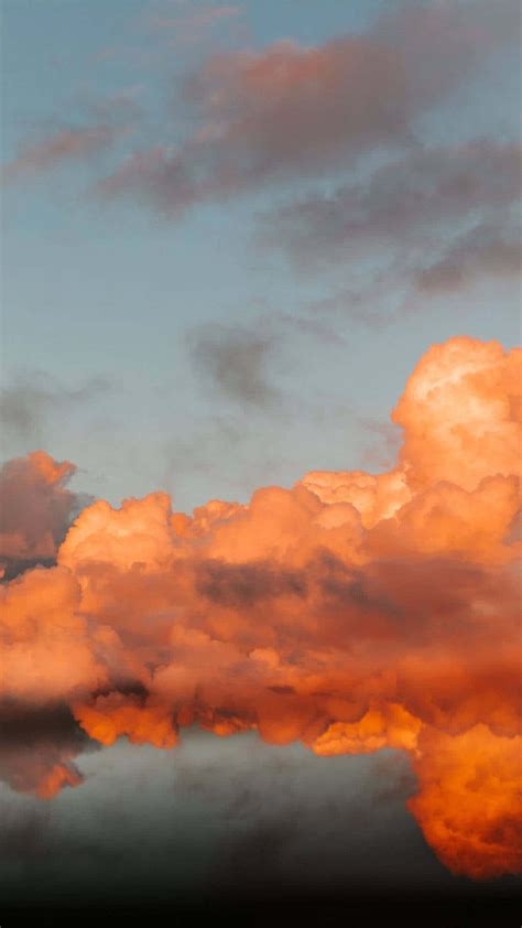 Download Clouds In Orange Aesthetic Phone Wallpaper | Wallpapers.com