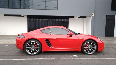 My first ever Porsche. 718 Cayman S guards red : r/Porsche