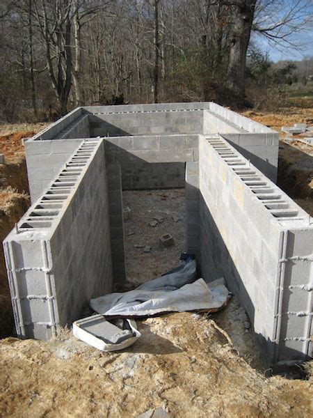 Building the Walls of the Root Cellar | Underground homes, Root cellar ...