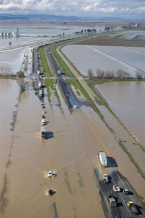 Photos: California storms cause flooding, downed trees and sinkholes