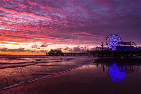 Santa Monica Pier In A Shell - at Sunset Photograph by Moshe Levis