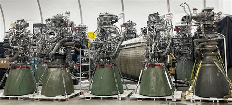 SpaceX fires up 11 engines as it prepares massive rocket for orbital ...