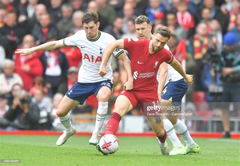 Liverpool's Jordan Henderson battles with Tottenham Hotspur's Ben ...