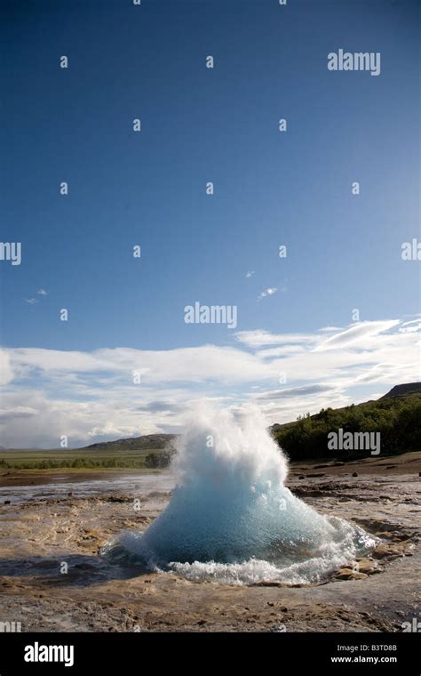 Geysir in the middle of eruption Stock Photo - Alamy