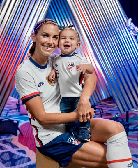 Alex Morgan #13, USWNT, with her daughter Charlie, USA vs Argentina ...