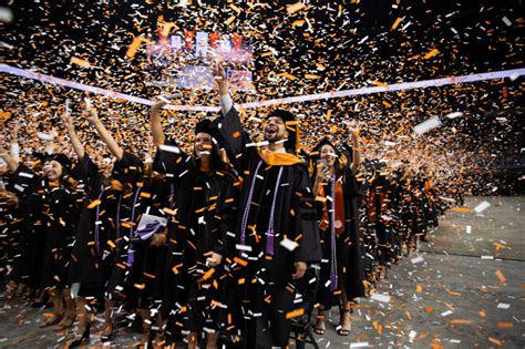 At all-school commencement, graduates walk across stage and into health ...