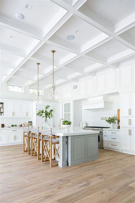 Coastal Farmhouse White Kitchen with light grey island and boxed beamed ...