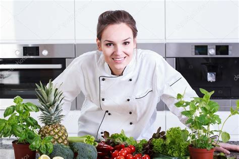 Lady chef preparing a dish — Stock Photo © photographee.eu #48757397