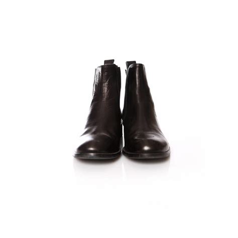 Russell & Bromley, black leather chelsea boots with silver metal on the ...