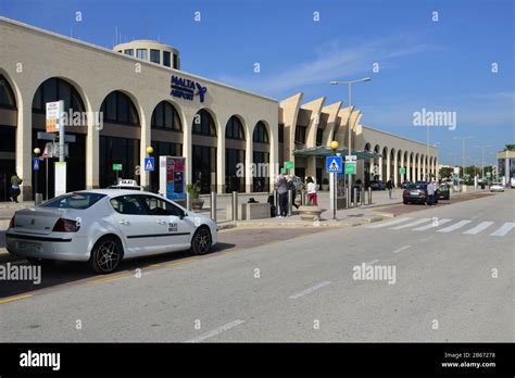 Arrivals at Malta international airport Stock Photo - Alamy