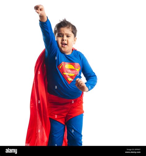 Boy dressed as a superman flying Stock Photo - Alamy