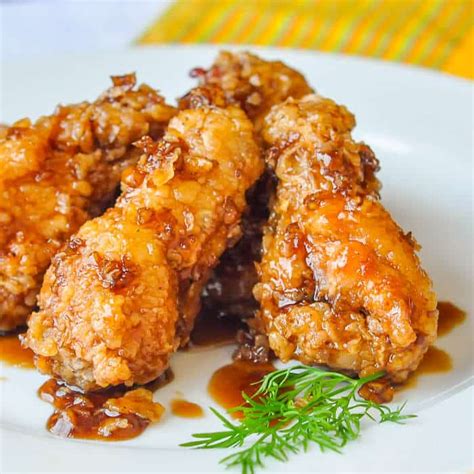 Crispy Honey Garlic Chicken Wings. Tossed in an easy honey garlic sauce.