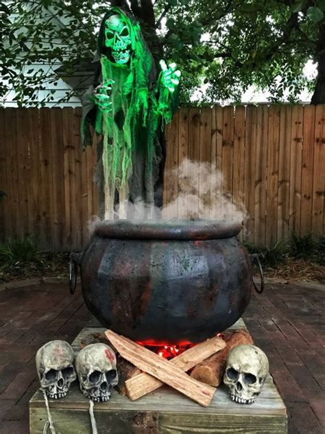 32 Witch Cauldron Halloween Decor Ideas - DigsDigs