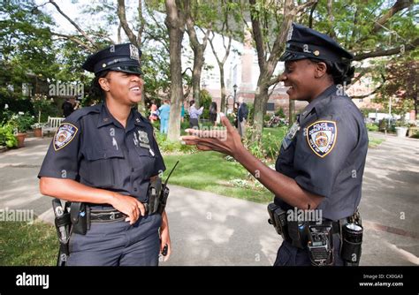 Female police officers having a conversation Stock Photo - Alamy