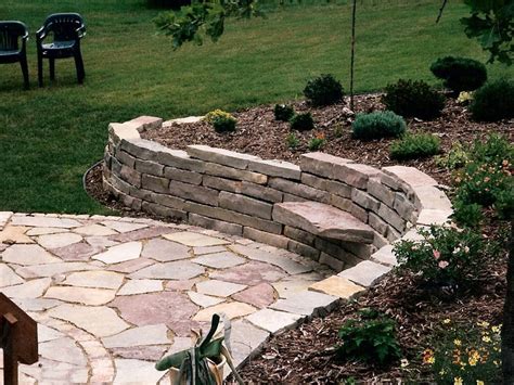 Large Stone Retaining Wall with Patio and Sitting Stones | Oasis ...