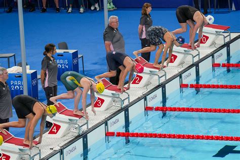 Anna Hopkin swims two rounds of 100m freestyle at Olympics | Arkansas ...